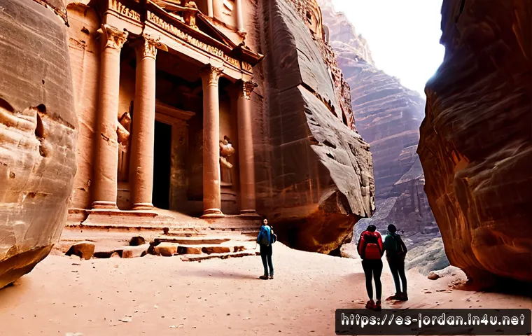 페트라 유적지 방문 가이드 - Photorealistic wide sunrise view of Petra’s rose-red sandstone Treasury facade framed by the narrow ...